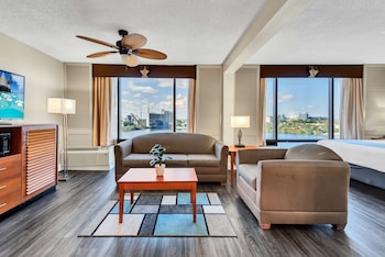 Suite, 1 King Bed, Non Smoking, Refrigerator & Microwave (with Sofabed) | Premium bedding, in-room safe, desk, laptop workspace at Best Western Orlando Gateway Hotel