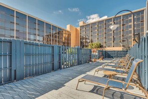 Outdoor pool, open 8:00 AM to 10:00 PM, pool umbrellas, pool loungers