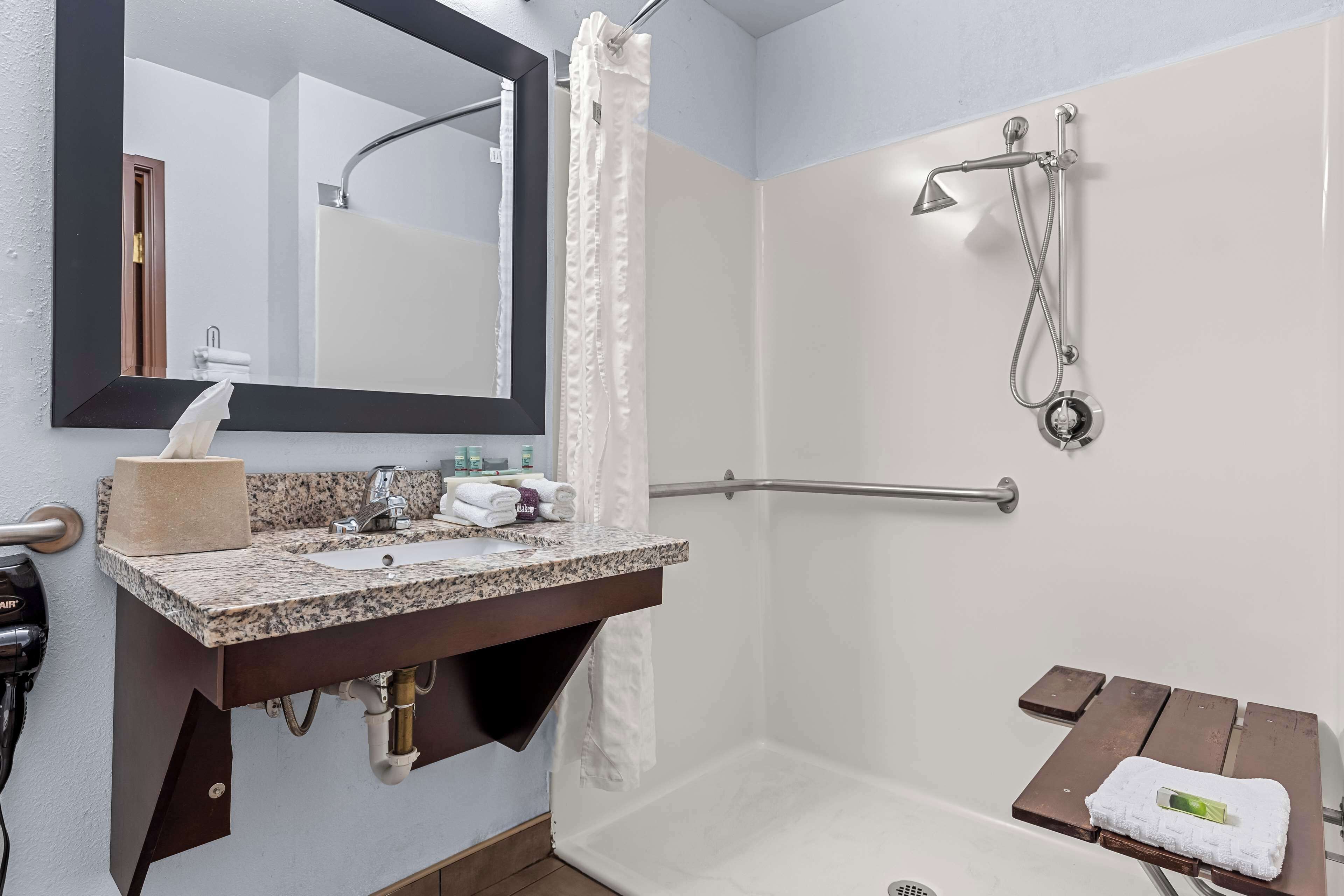 standard room, 2 queen beds, accessible, non smoking | bathroom | combined shower/bathtub, hair dryer, towels