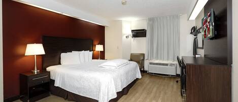 Desk, laptop workspace, blackout curtains, iron/ironing board