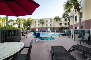 Outdoor pool, pool umbrellas, sun loungers