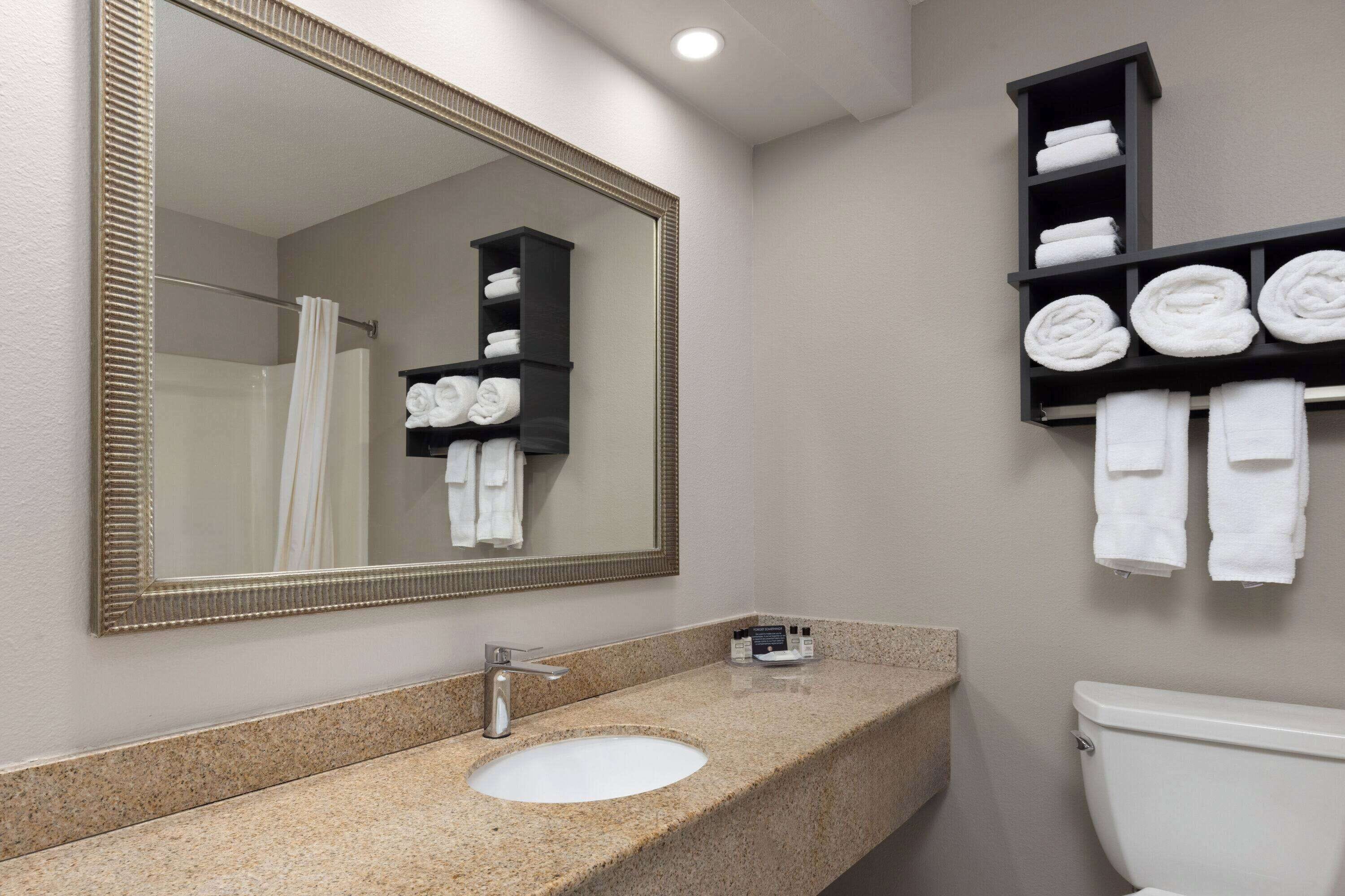 suite, 1 bedroom, non smoking (efficiency) | bathroom | combined shower/bathtub, hair dryer, towels