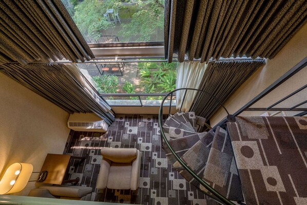 Suite, 1 King Bed with Sofa bed (Coast Townhouse Loft Suite) | 1 bedroom, desk, iron/ironing board, free cribs/infant beds