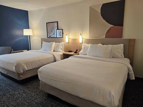 Premium bedding, individually decorated, individually furnished, desk
