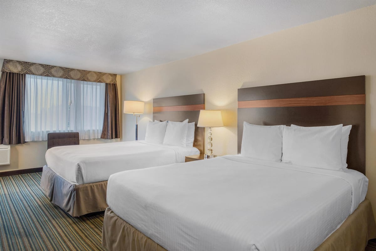 Standard Room, 2 Queen Beds, Non Smoking | In-room safe, desk, laptop workspace, iron/ironing board