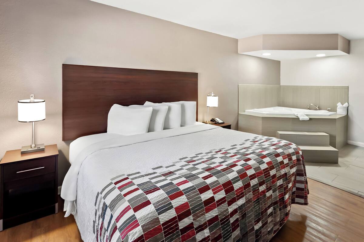 Chambre Supérieure, 1 très grand lit, fumeur, bain à remous