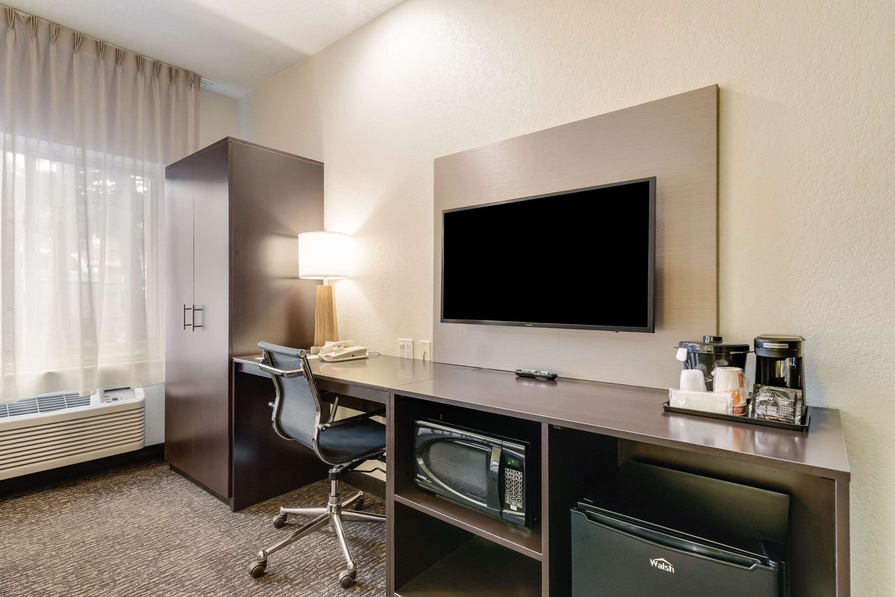 desk, blackout curtains, iron/ironing board, free cots/infant beds