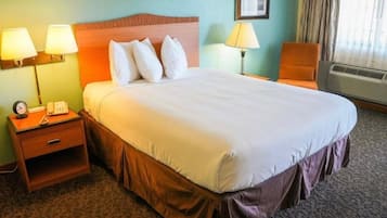 Desk, bed sheets, alarm clocks