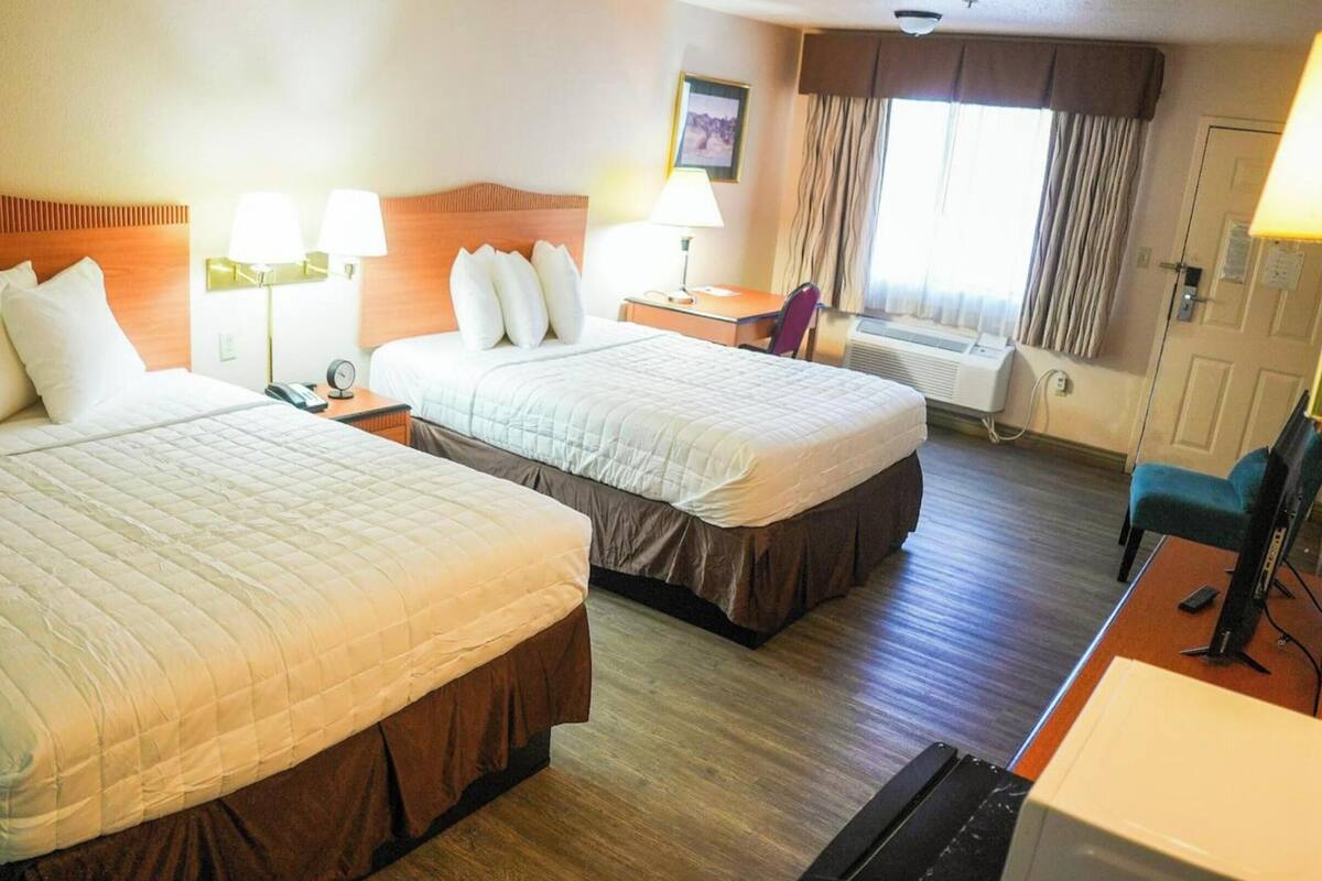 Room, 2 Queen Beds, Non Smoking | Desk, bed sheets, alarm clocks