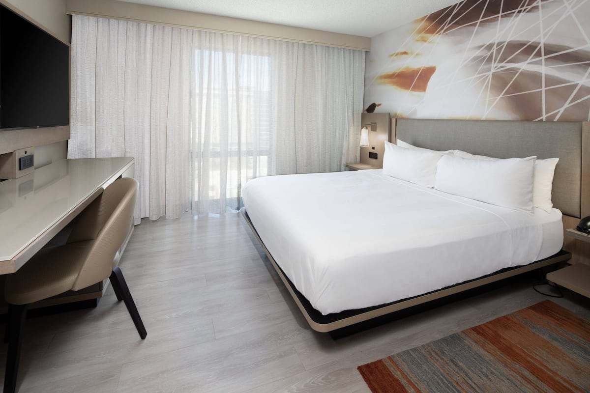 In-room safe, desk, laptop workspace, blackout curtains