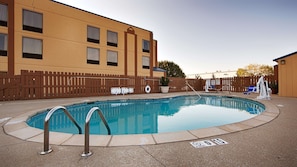 Seasonal outdoor pool, pool loungers