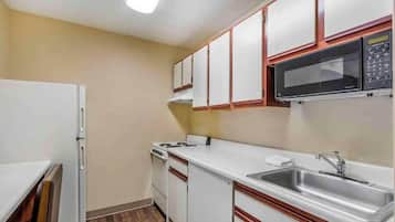 Full-size fridge, microwave, stovetop