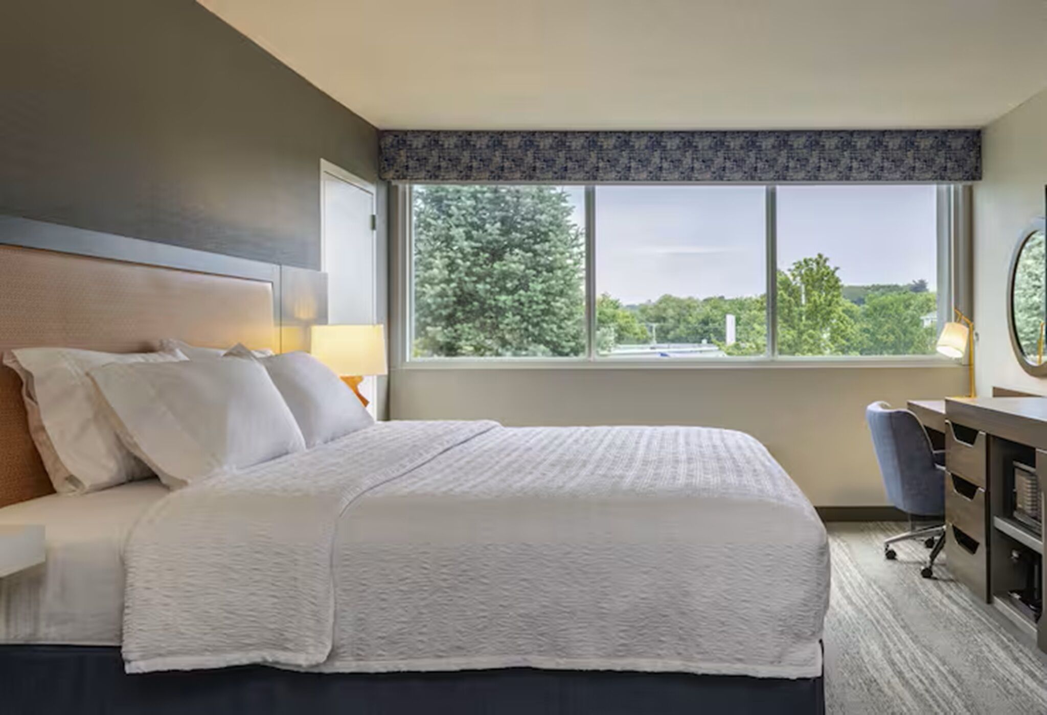 Premium bedding, pillowtop beds, desk, laptop workspace