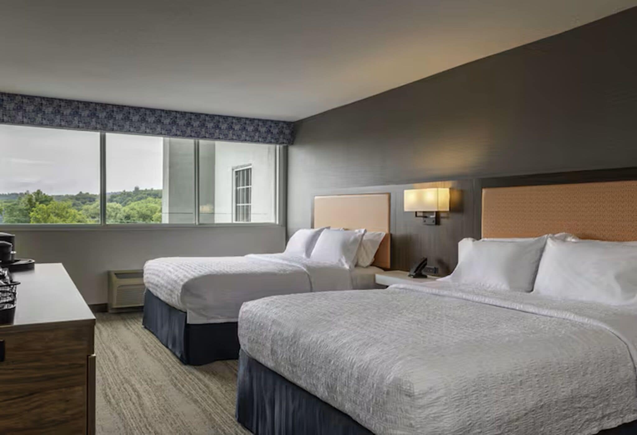Premium bedding, pillowtop beds, desk, laptop workspace