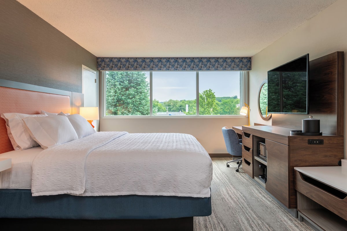 premium bedding, pillow-top beds, desk, laptop workspace