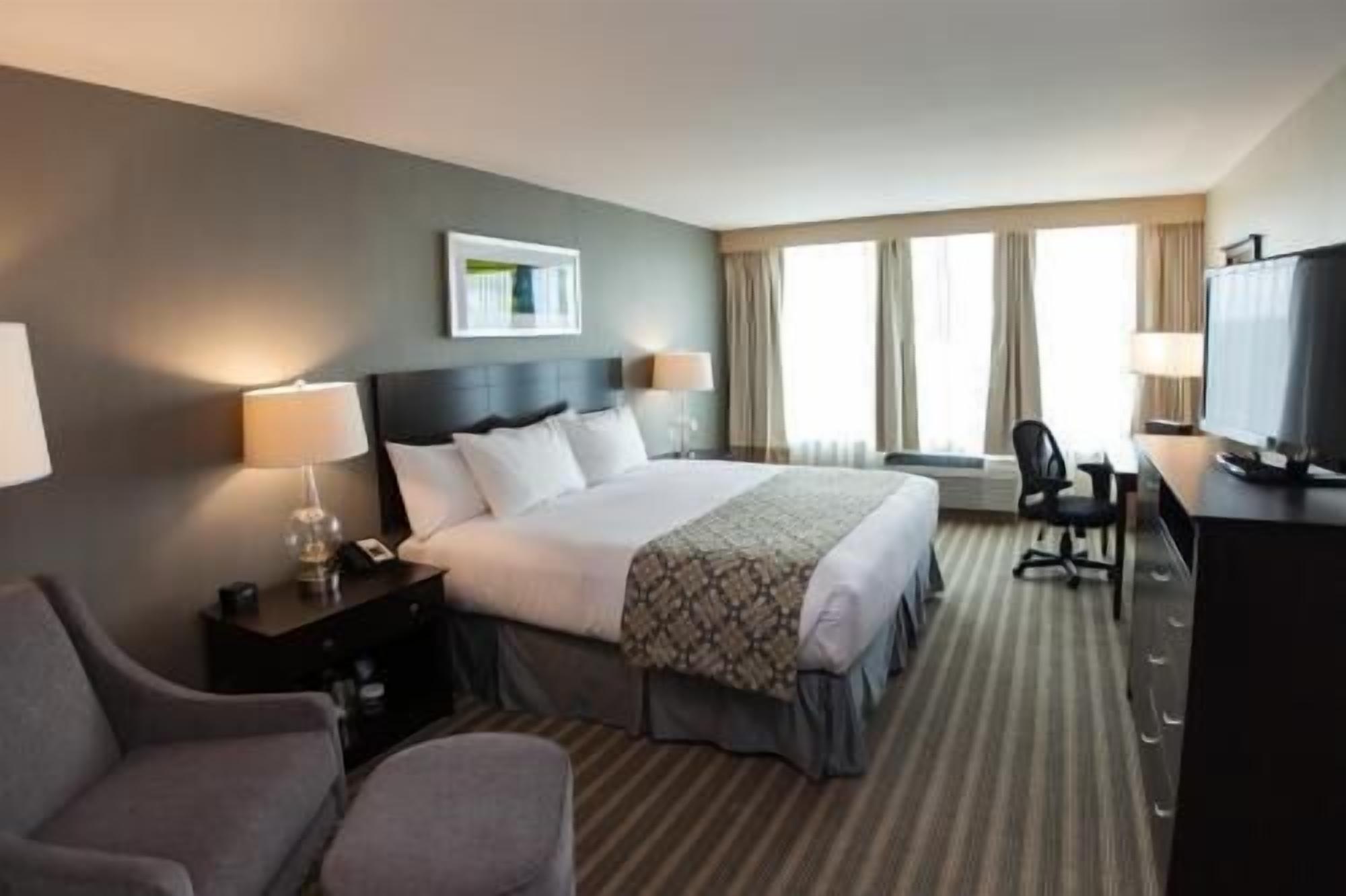 Luxe beddengoed, een kluis op de kamer, verduisterende gordijnen