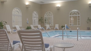 Indoor pool, open 7 AM to 10 PM, pool loungers