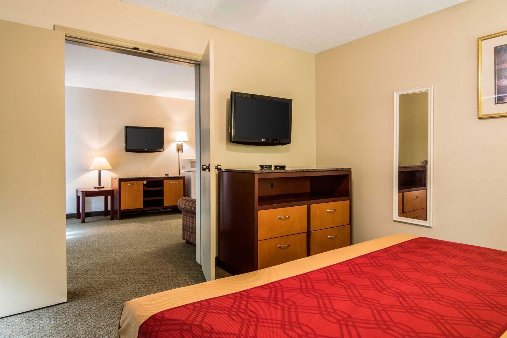 Desk, blackout curtains, iron/ironing board, rollaway beds