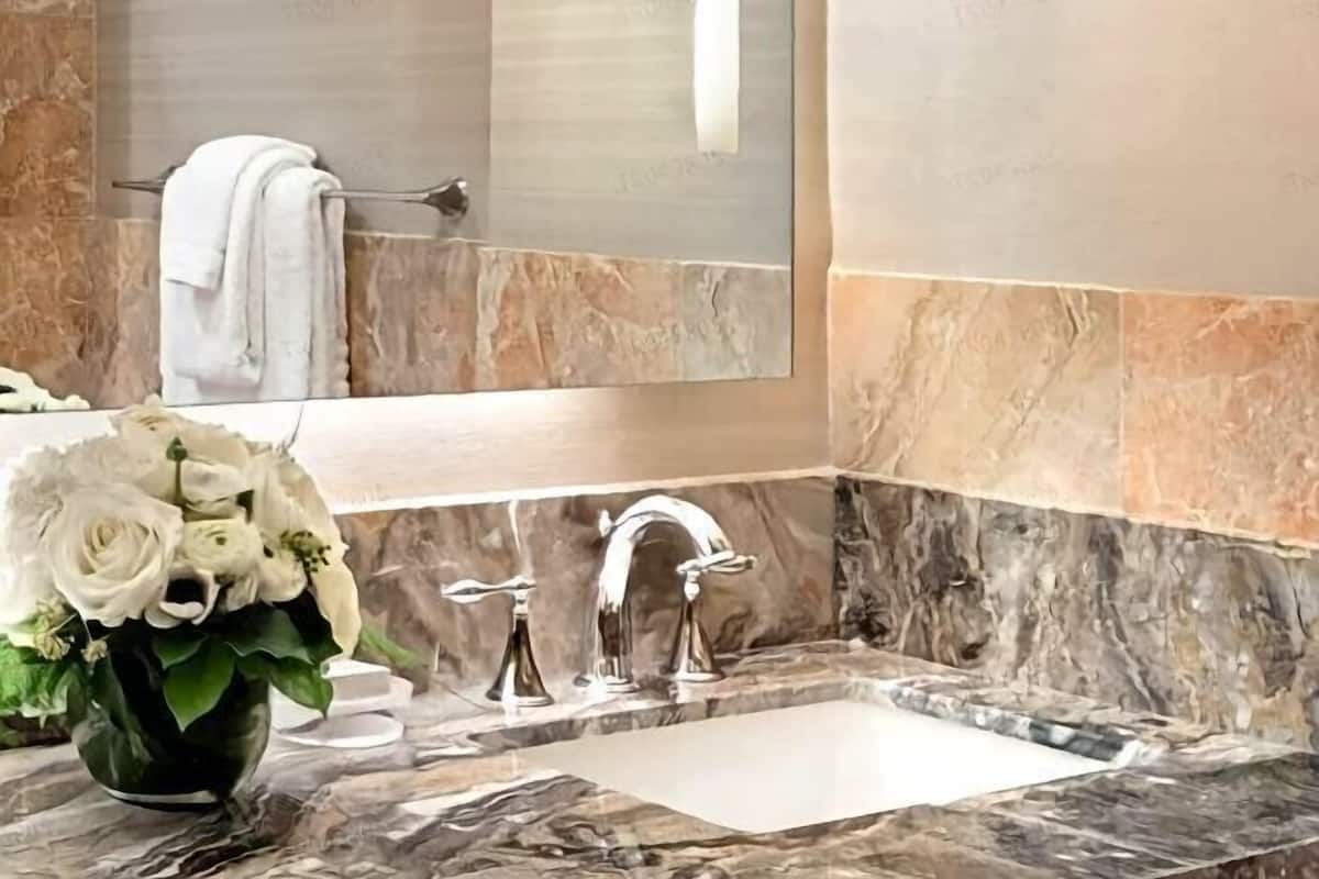 Combined shower/bathtub, deep-soaking bathtub, designer toiletries