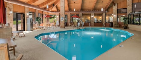 Indoor pool, pool umbrellas, pool loungers