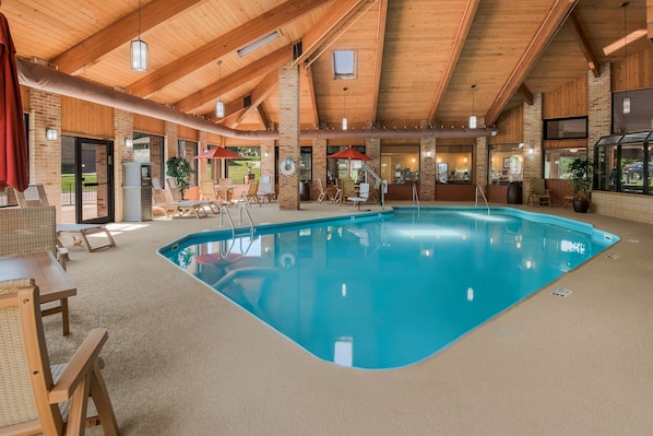 Indoor pool, pool umbrellas, pool loungers