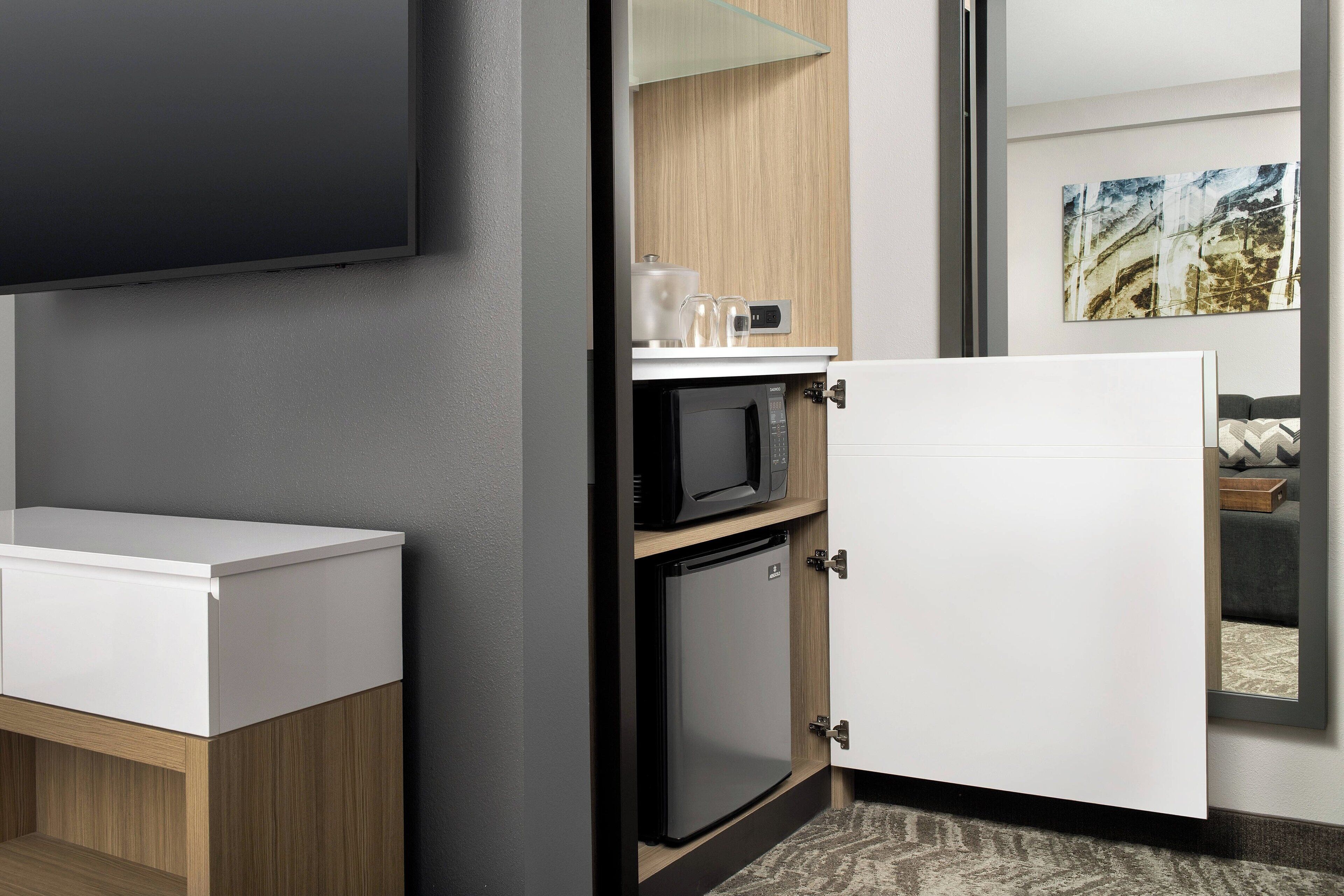 premium bedding, pillow-top beds, desk, laptop workspace