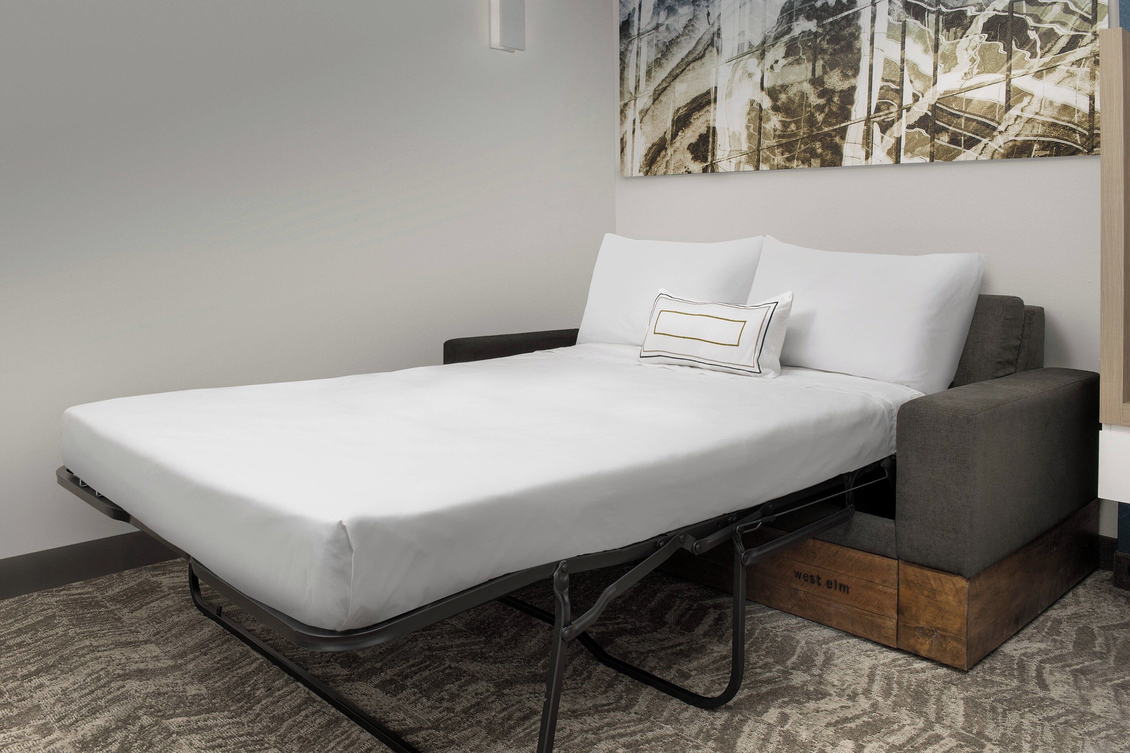 premium bedding, pillow-top beds, desk, laptop workspace