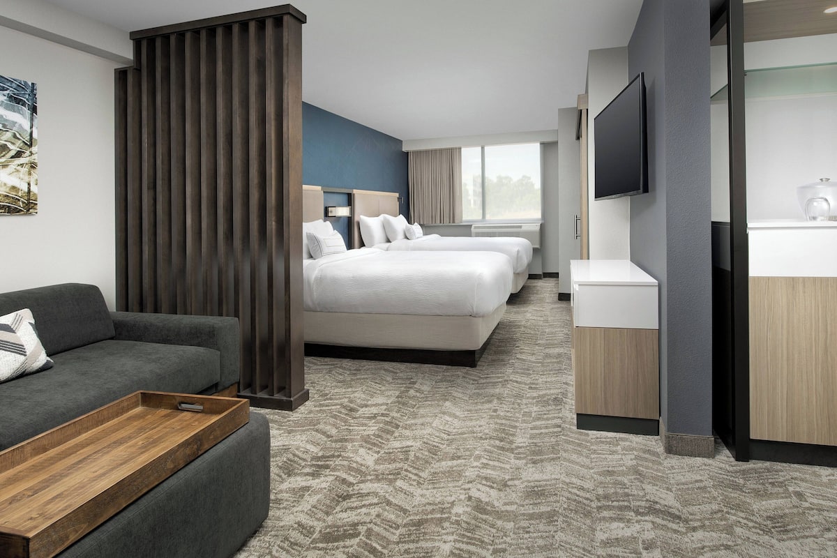 premium bedding, pillow-top beds, desk, laptop workspace