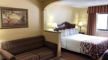 Desk, laptop workspace, blackout drapes, iron/ironing board