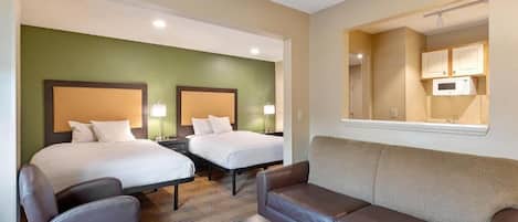 Premium bedding, desk, laptop workspace, free WiFi