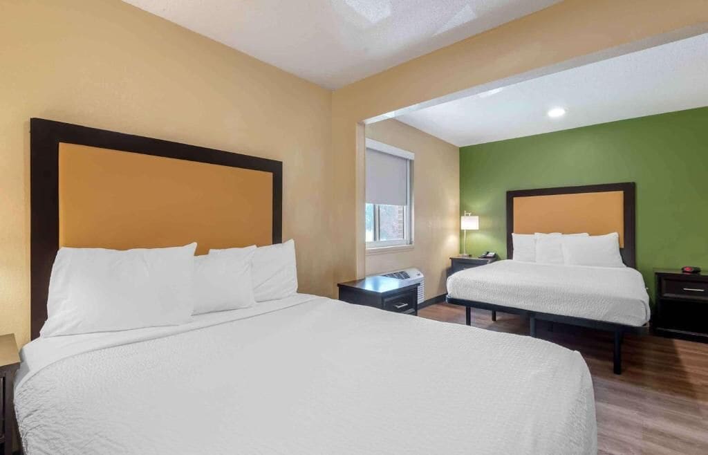 Premium bedding, desk, laptop workspace, free WiFi