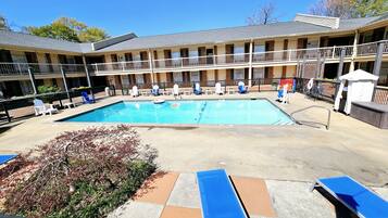 Seasonal outdoor pool, pool umbrellas, sun loungers
