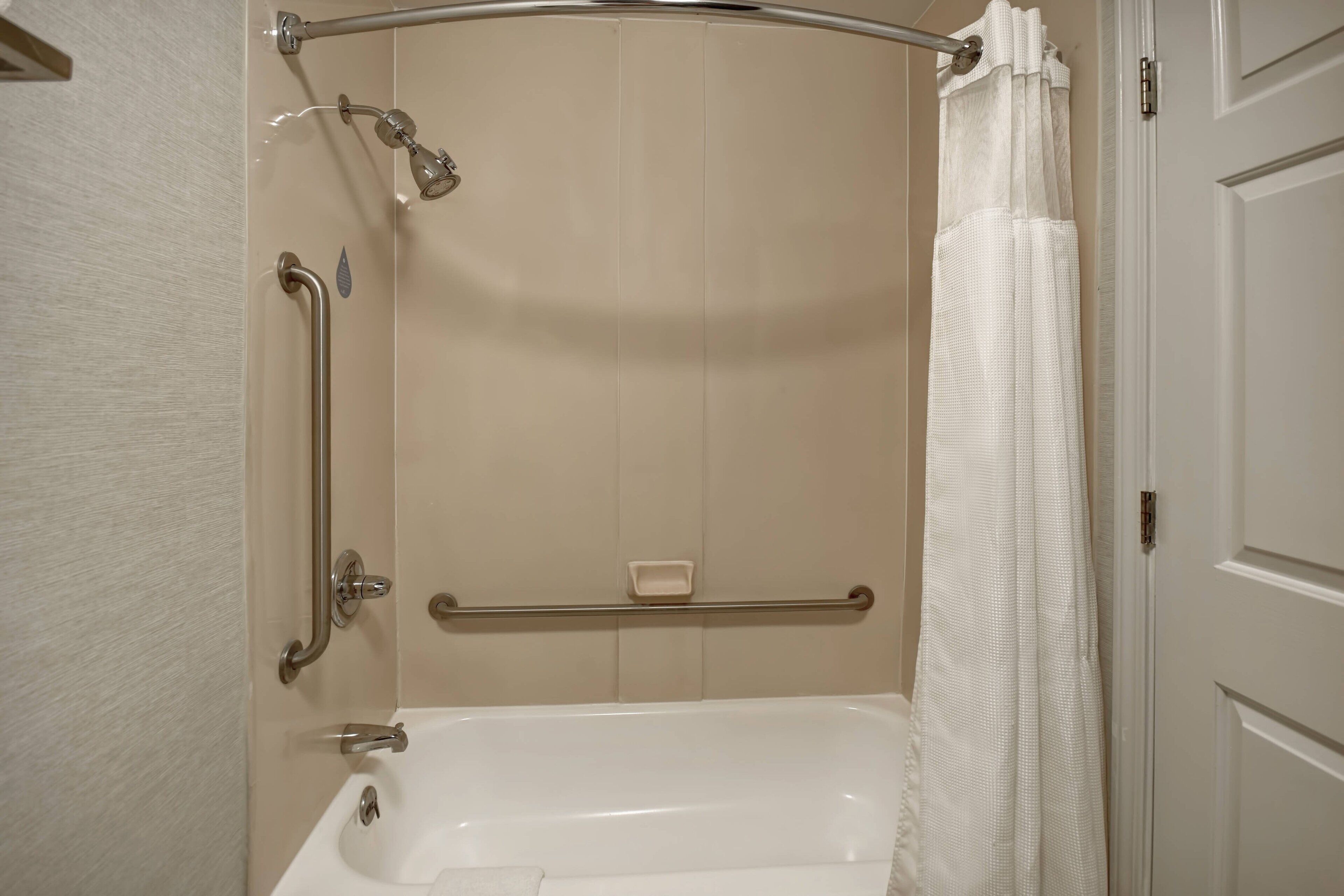 combined shower/bathtub, free toiletries, hair dryer, towels