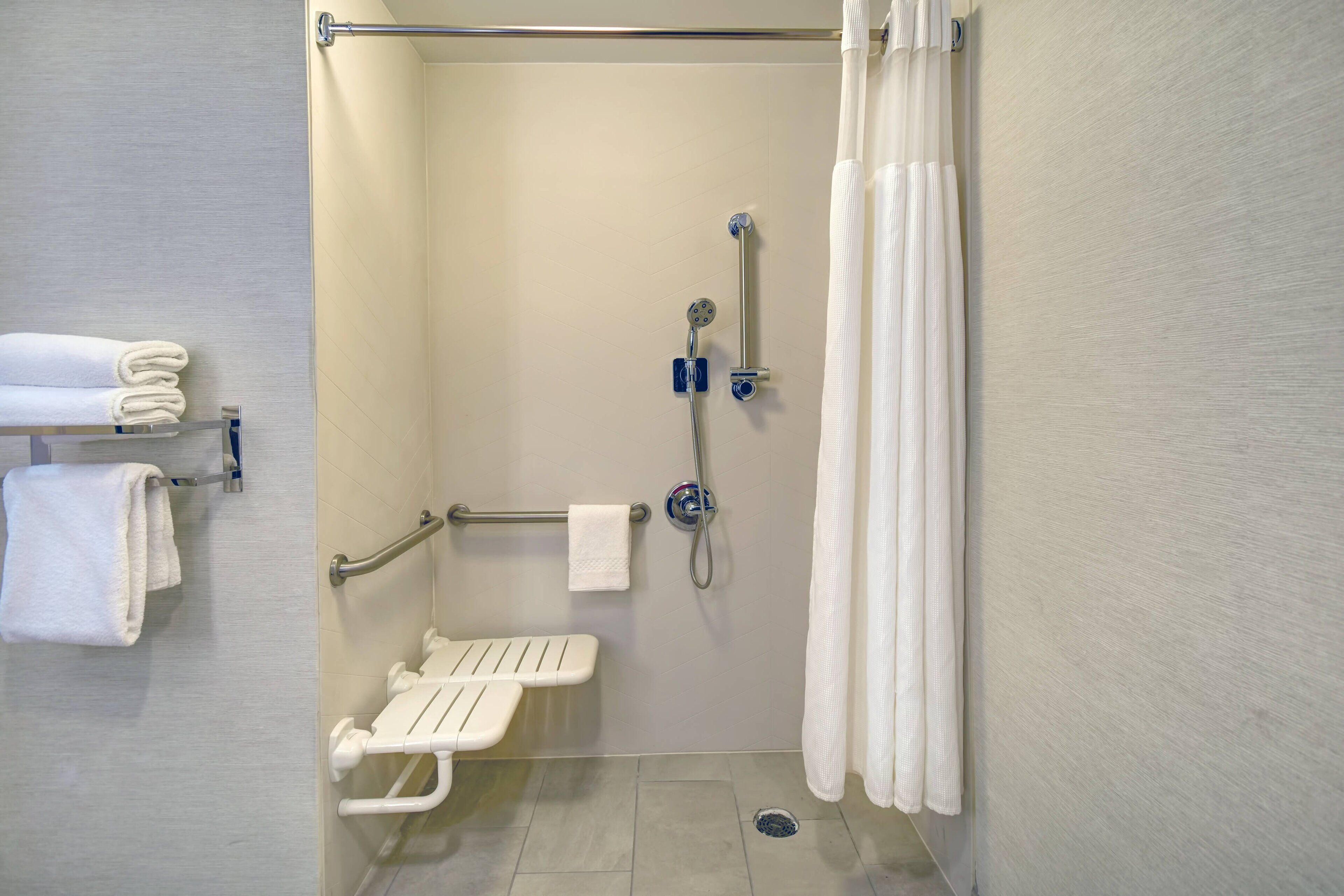 combined shower/bathtub, free toiletries, hair dryer, towels
