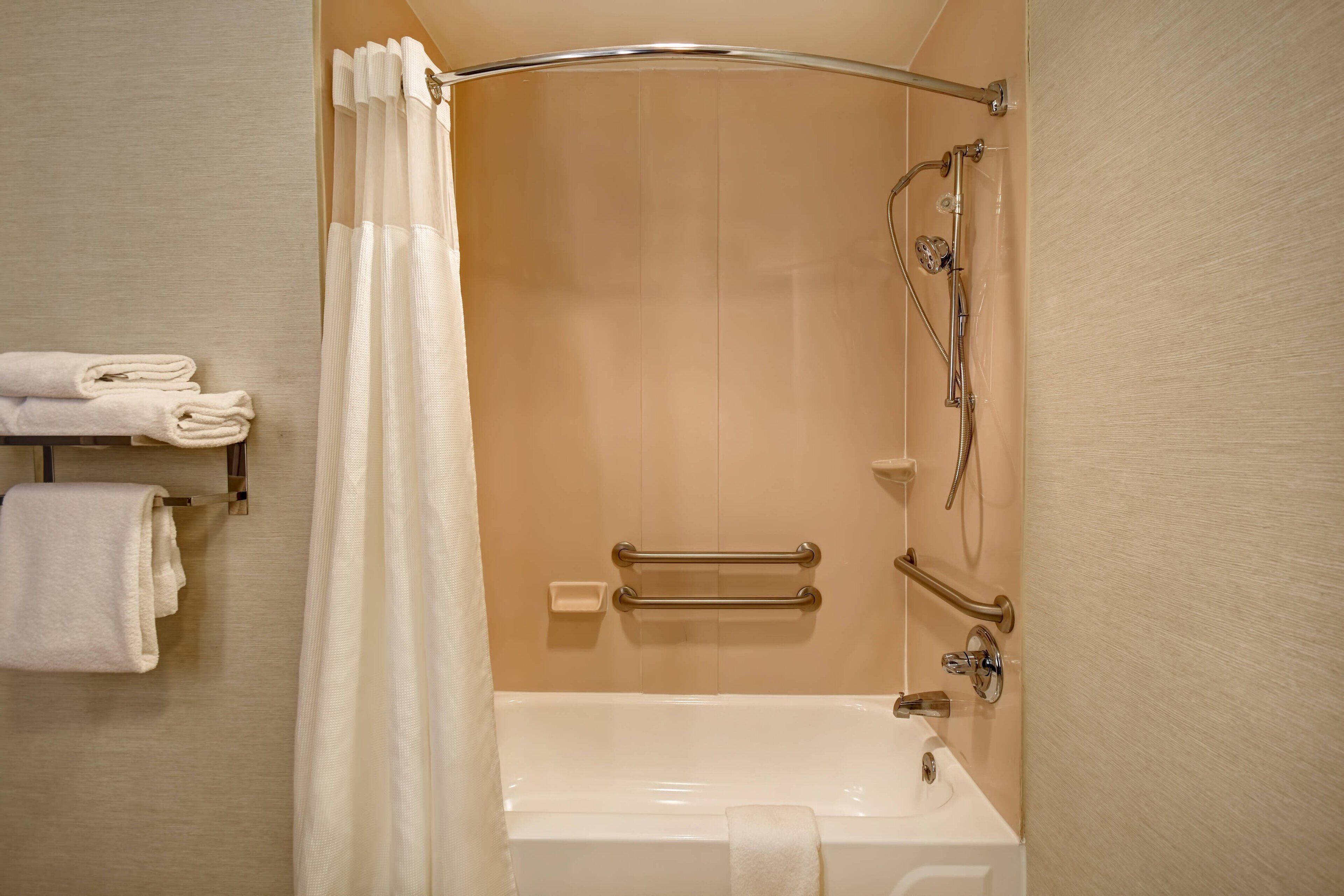 combined shower/bathtub, free toiletries, hair dryer, towels
