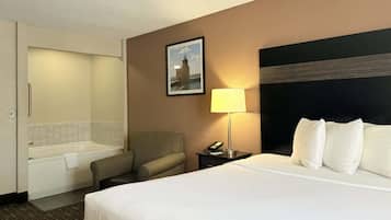 Deluxe Room, 1 King Bed, Non Smoking | Hypo-allergenic bedding, iron/ironing board, free cribs/infant beds