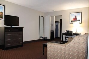 Suite, 1 King Bed, Non Smoking | Living area | 40-inch LCD TV with satellite channels, TV, pay films - AmericInn by Wyndham Holland MI (Holland)