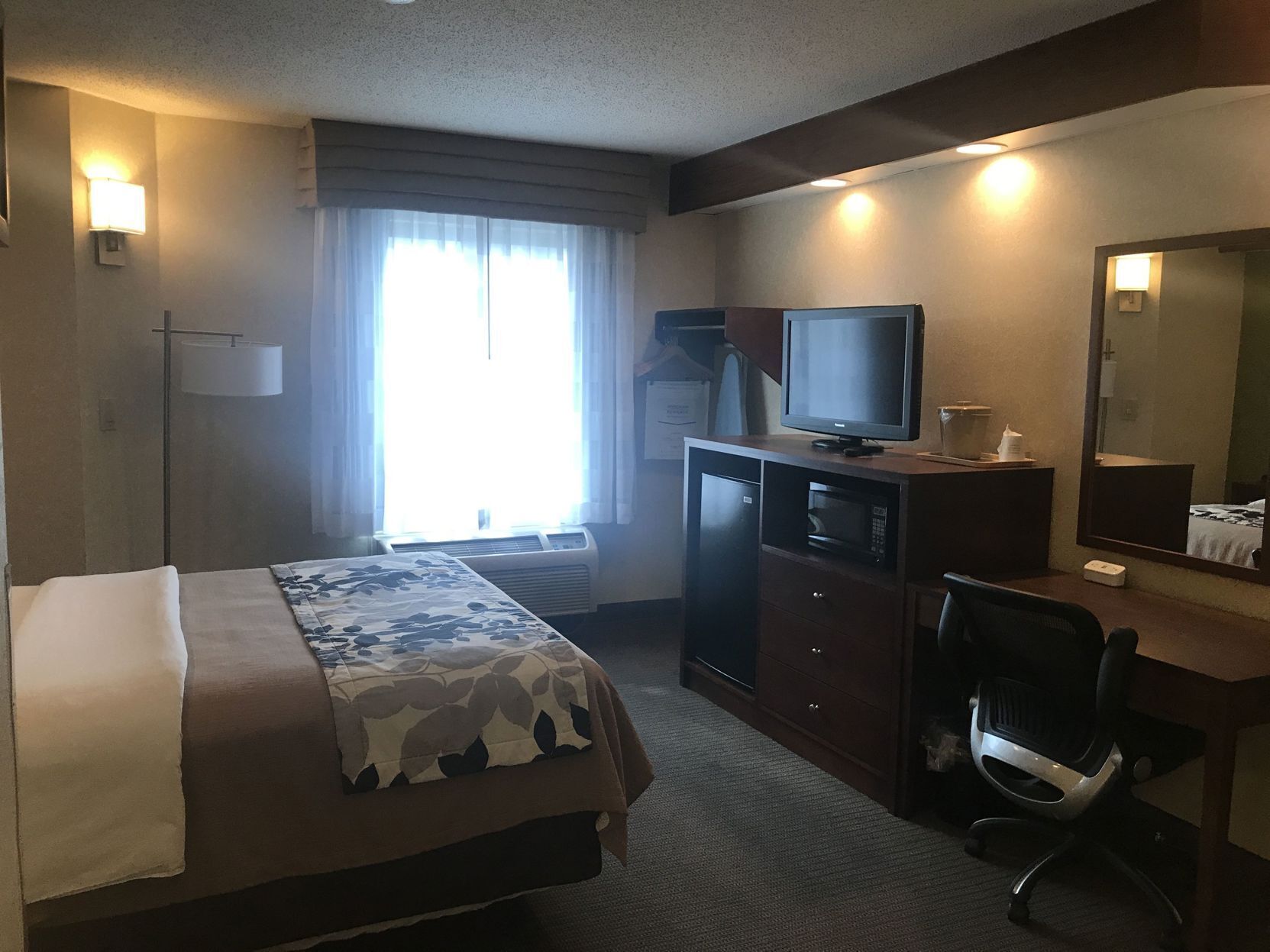 Down comforters, desk, laptop workspace, blackout drapes