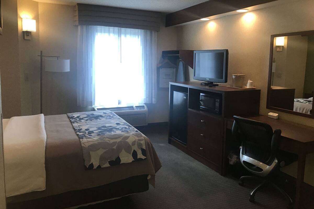 Down comforters, desk, laptop workspace, blackout drapes