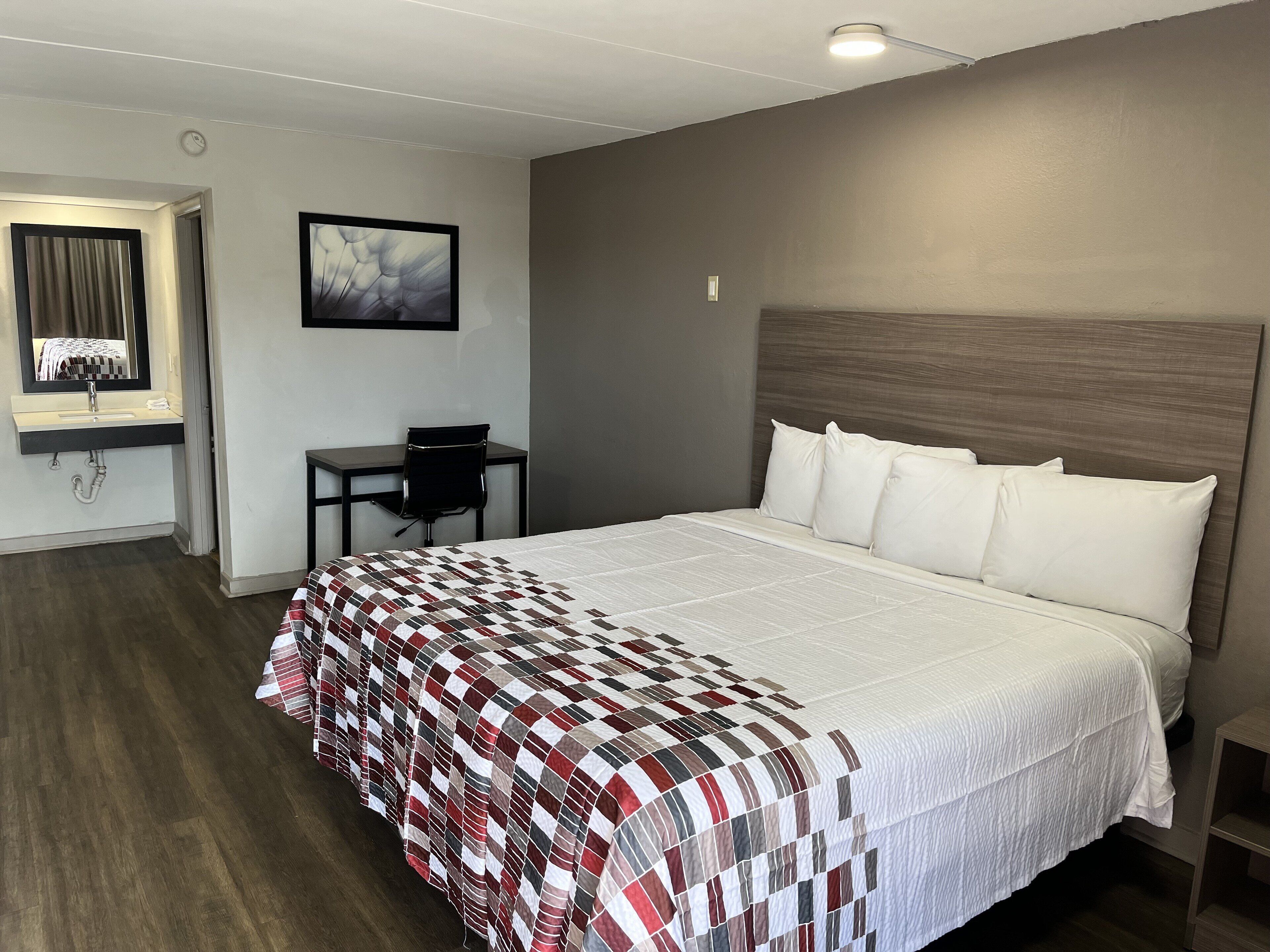 Desk, laptop workspace, blackout drapes, free WiFi