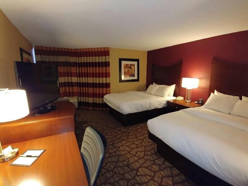 Premium bedding, down duvets, in-room safe, desk