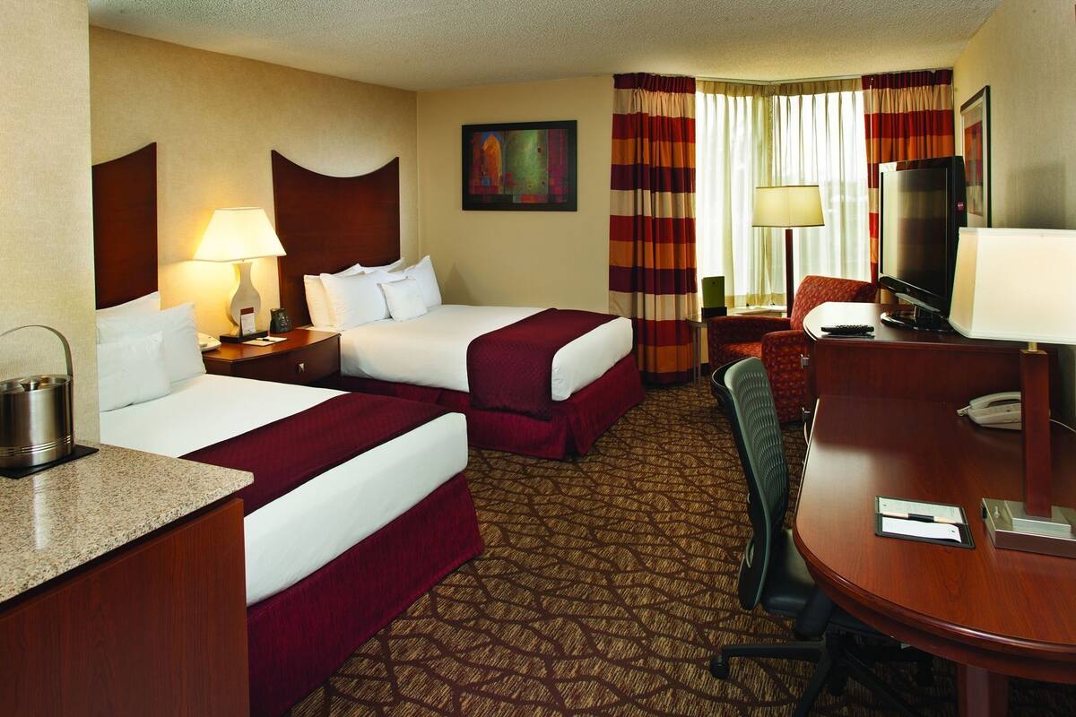 Premium bedding, down comforters, in-room safe, desk