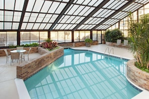 Indoor pool, outdoor pool, pool umbrellas, pool loungers