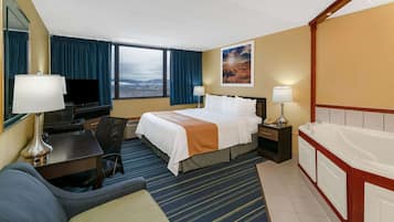 Standard Room, 1 King Bed, Non Smoking, Jetted Tub | Desk, laptop workspace, blackout drapes, iron/ironing board