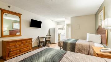 Fridge, microwave, stovetop, dining tables