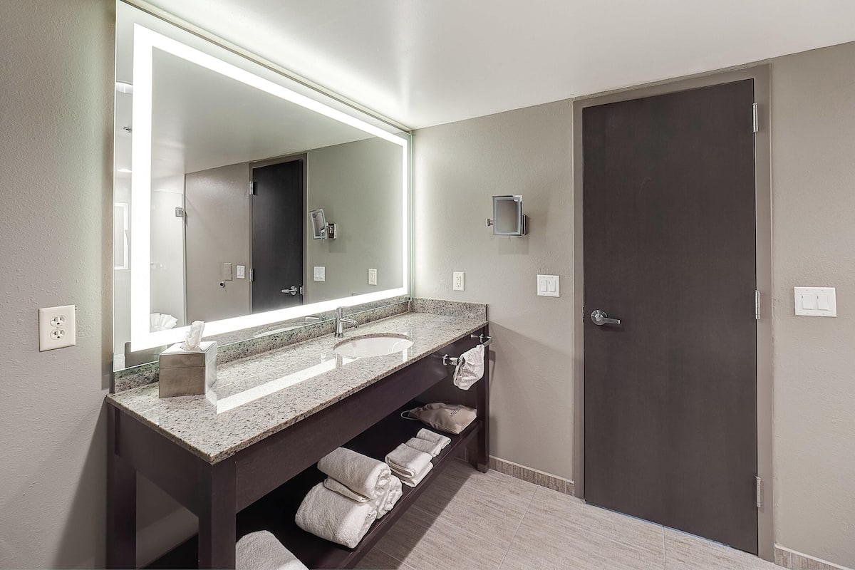 Eco-friendly toiletries, hair dryer, towels, soap