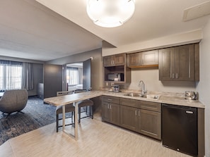 Executive Suite, 1 King Bed | Private kitchenette | Fridge, microwave, coffee/tea maker