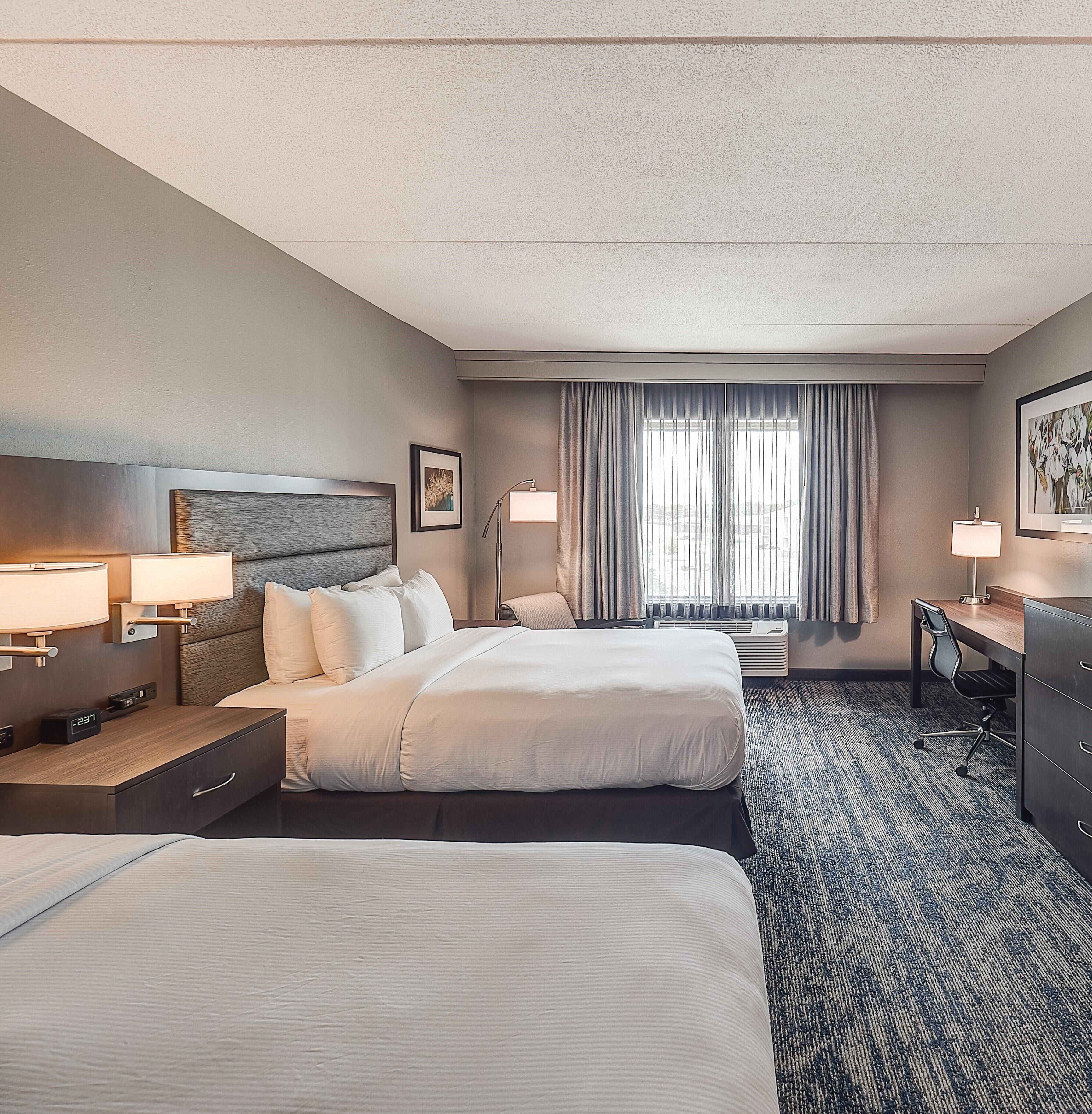 Premium bedding, down comforters, in-room safe, desk