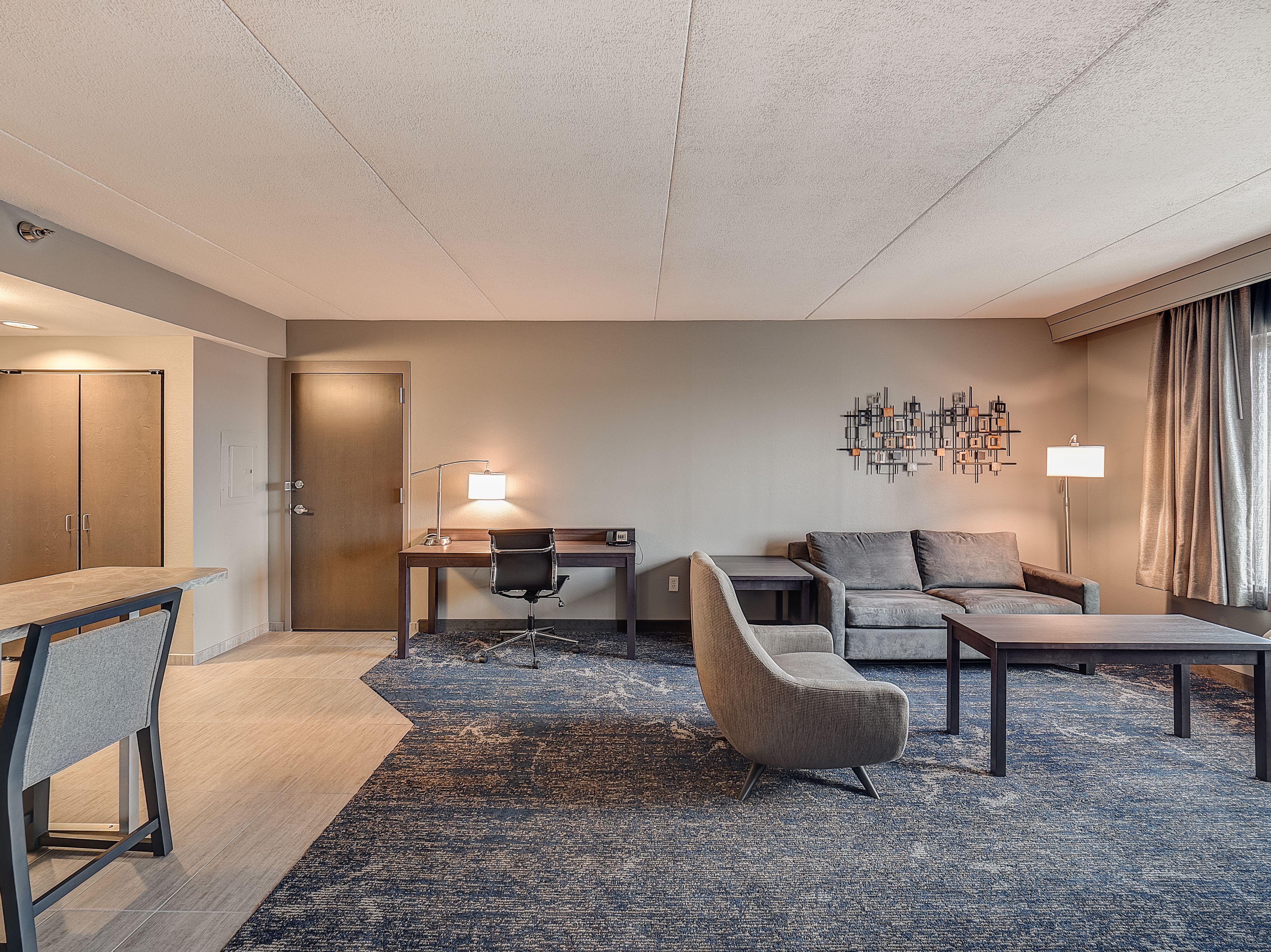 executive suite, 1 king bed | living room | 50-inch led tv with satellite channels, tv