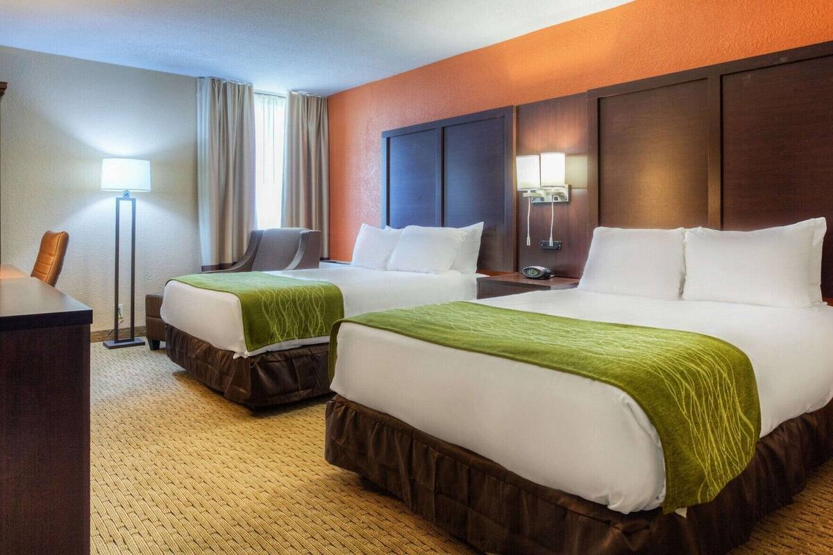 Pillow-top beds, desk, blackout curtains, iron/ironing board
